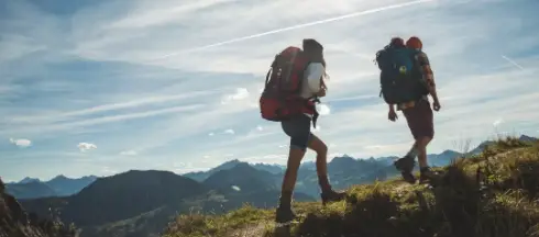 hiking uphill with backpacks hiking uphill with backpacks