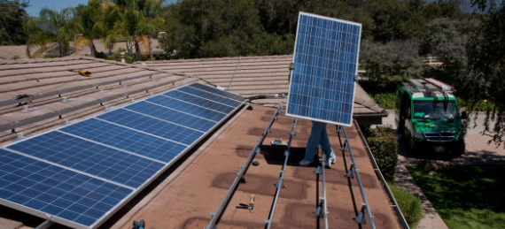 installing solar panel on small home roof installing solar panel on small home roof